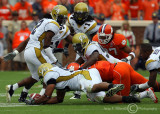 Jackets DE Morgan dives on and recovers a Clemson fumble