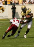 WR Chris Dunlap side steps a Troy defender