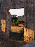 Through an open window.