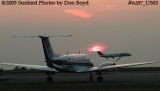 Bell Construction (Brentwood, TN) Beech 200 King Air N70RB and Northwest Airlines DC9 sunset airline stock photo #6207_US03