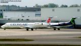 Crossair EMB-145-LU HB-JAQ and Indigo EMB-135LR N302GC airliner aviation stock photo #7207