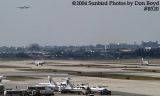 View of MIA's airfield with NW DC9-31 N8950E taking off airline aviation stock photo #8520