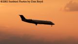 Delta Connection Canadair Regional Jet sunset airline aviation stock photo