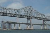The new bridge (stopped by Schwarzenegger) and the old Bay Bridge
