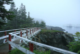 You go over a bridge and climb at least two ladders.