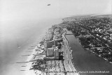 1950's - aerial view of Miami Beach depicting Collins Avenue, the Edec Roc and Fontainebleau Hotels
