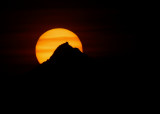 Sun behind Lomnicky stit, High Tatras