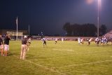 coach suriano looks on under the lights