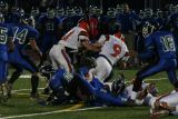 jeff hirsch and joseph becker make the tackle