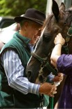 Doug Sutherland helping with tack