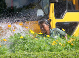 Watering the plants in Lumpini Park.