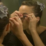 Alessandra Puts On Her Eyelashes