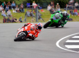 Casey Stoner Marlboro Ducati leading Ant West Kawasaki Racing Team