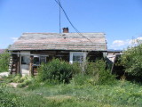 The old house Tom spent the winter in during high school