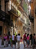 People+alley+play of light and shadow = a common scene in Barcelona