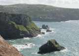 looking towards St Agnes from Trevellas Porth - birdy cove behind natural rock arch