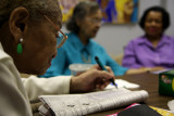 Marjorie works a puzzle