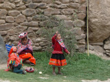 Local girls helping their moml