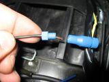 Insert the same color wire from the light harness and thread in the cap