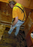 THE BASEMENT FLOORING WAS ROTTED AND COVERED WITH MOLD