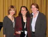 Jean (center) accepts her 2009 HPPAE Leadership Award as Outstanding Principal Investigator