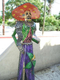 A figure outside Mi Casa