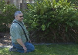 George inspecting the sprinkler system