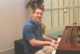 CR playing the piano
