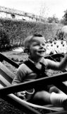Young Tony in an easy chair