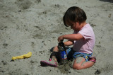 Claire filling her drinking water with sand