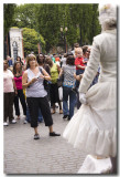 At Market Day, a street performer has an audience.