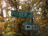 Sign at Parker: Milepost 18.  Parker road is about a mile of  the former railroad grade.