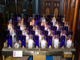 Blue and white votive candles were also illuminated.