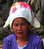 Xijiang Miao woman on top of the mountain