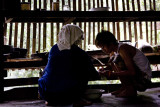 Cooking the meal, Karen village, Thailand 2008