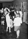 Look at those clothes. How fashions have changed!