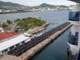 New cars were parked on two docks near our Acapulco pier.JPG