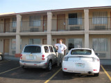Roy and our HHR Budget rent a car in front of our first Super 8 motel