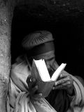 Hiding behind the bible bw.jpg