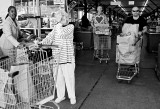 Mom leaving Caninio's Market 01 bw