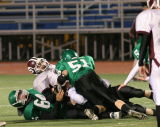 Roman Ismagilov and Lee Rogers tackling Sidneys Drew Fessenden