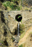 Small waterfall and bridge