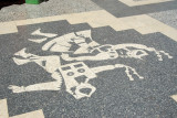 Dancing figures on the pavement, Calle Lima, Puno