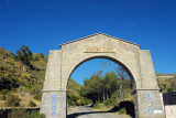 Archway and the entrance to the south rim village of Achoma