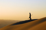 Martial arts practice on the dunes at sunset, Huacachina