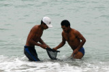 Fisherman braving very cold water