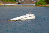 Wreck of a small boat, Aqua World Marina