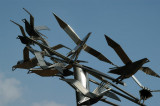 Modern metal sculpture of birds in flight, Teacher-Student Center, Dhaka University