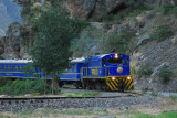 To reach Machu Picchu, you can either hike the Inca Trail or take the train