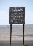 When approaching a sensitive military area, obey the warning signs